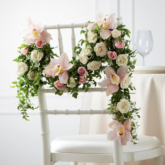Orchid Rose Chair Décor – CARLOS BLOOMS & EVENTS, Garnerville NY